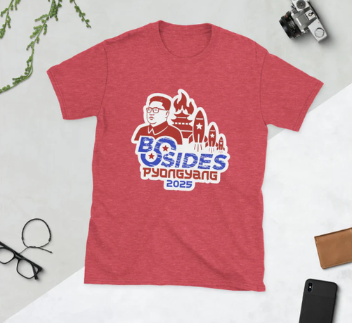 Red t-shirt with a BSides Pyongyang 2025 and logo of their leader and rocket imagery.