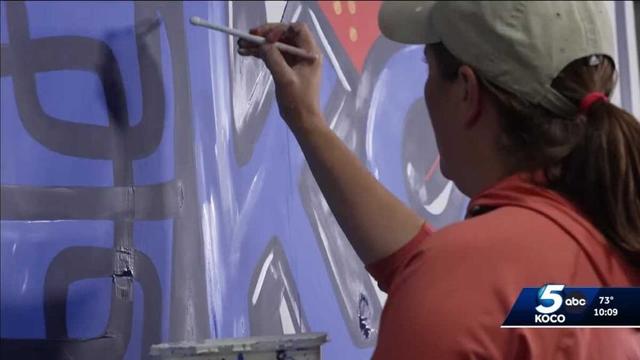 OKC artist's window paintings celebrate Thunder's NBA Finals run
