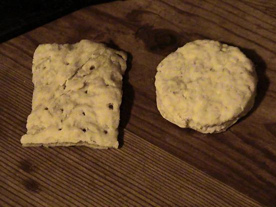 This is a photo of two hardtack biscuits.

On the left is a square one, with little holes possibly made by weavil infestation and used by the land forces during the American Civil War, while the right biscuit is round, without holes, used in the same conflict by sailors.