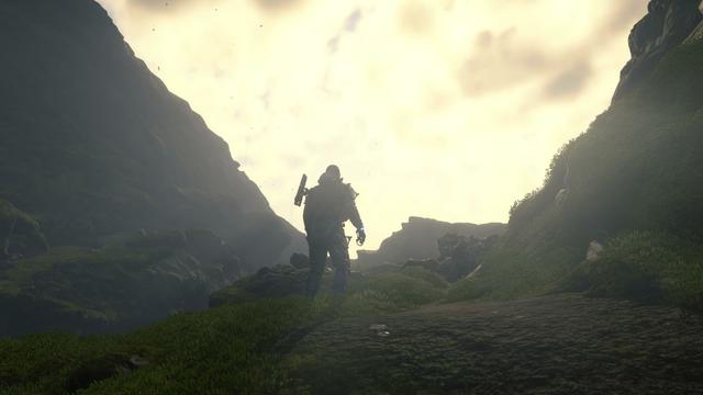 Sam climbing some cliffs in sunlight.