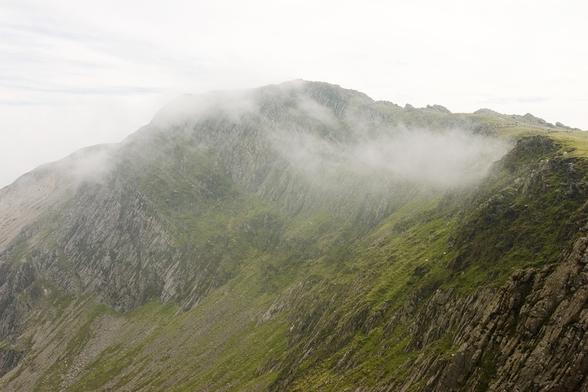 The peak of Cadair Idris in Wales, surrounded by mist. Photo by Matthew Austern.