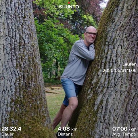 IMe leaning at a tree
