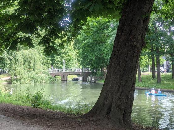 Rustic view of a canal near Lepelenburg park in the city centre of There are boats in the canal.