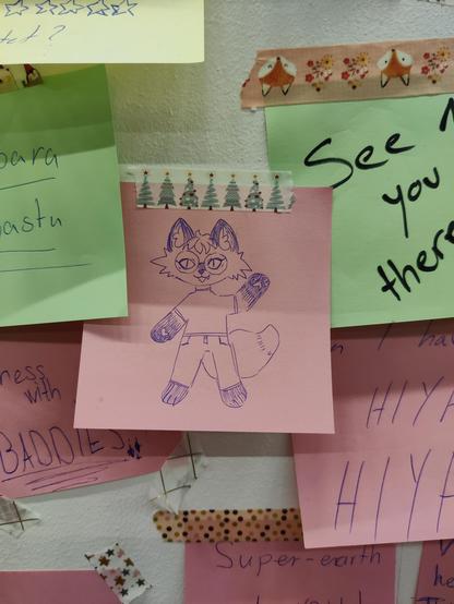 A sticky note with a drawing of an anthro fox girl. It is hung up on a wall full of sticky notes with drawings and messages.