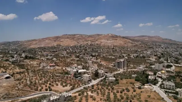 A drone view shows the town of Huwara, south of Nablus, in the Israeli-occupied West Bank, May 30, 2025. (Reuters)