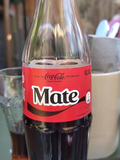 Ein Coca-Cola-Flasche mit Namensaufdruck - hier ist er "Mate"