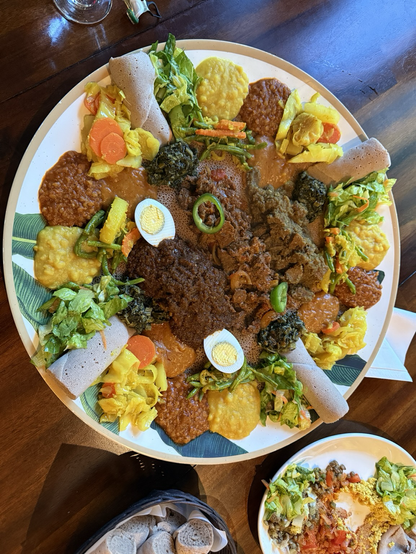 Dinner for 4 at the Queen of Sheba Ethiopian restaurant where I dined with my Penn State colleagues at DHSI!