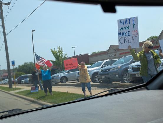 The end of a bunch of local Madison folks holding signs that say "Save Democracy" and "Hate Won't Make Us Great." They're all about what you'd expect from the phrase "slightly over middle-aged Wisconsinites."