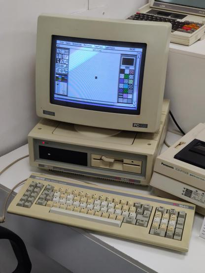 A portrait of the PC1640 beige case, keyboard and colour screen, showing a GEM paint program.

The machine has an IBM style 101 key keyboard, a 5¼ inch floppy drive and a glorious full height hard disk drive that rumbles like a train going over a masonry bridge.