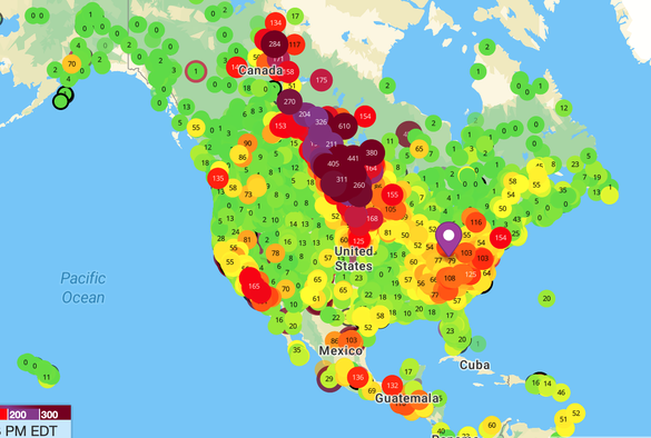 A terribly colorful screencap from Purple Air of North America, showing a large swath of yellows, oranges, reds and maroons starting way up by the arctic circle, and slicing down to the south-eastern US coast.  People up in Saskatchewan and North Dakota certainly have it much worse than we do (some readings at 370), but the Asheville area is currently sitting at around 87 which is high enough not to want to be breathing it.

I thought the haze was fog this morning, but clearly I was very wrong.