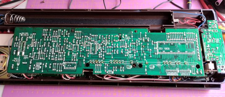 inside after opening it, giving a view on the back side of the PCB