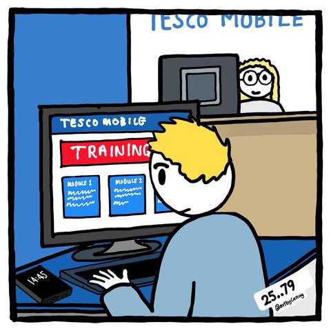 Pictured sitting at a terminal carrying out training for my new job. The main desk infront and staff member looking out.