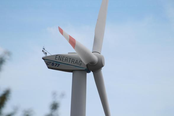 The turbine housing and rotor of a large wind turbine.