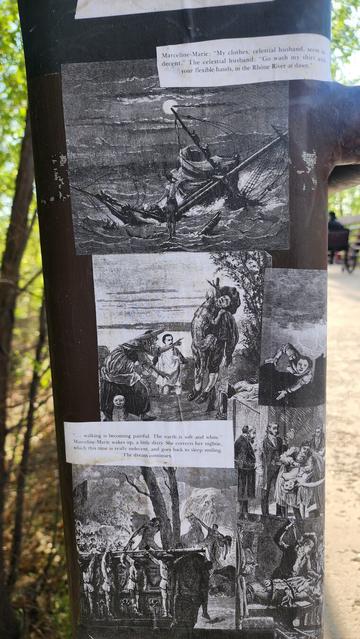 color photo of wheat paste art found on bridge - black and white engraving what?