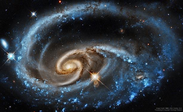 Spiral galaxy showing evidence of on-going gravitational interaction with another.