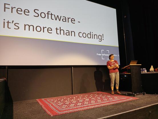 Birgit Hücking presenting their talk with first slide

Free Software - it's more than coding!