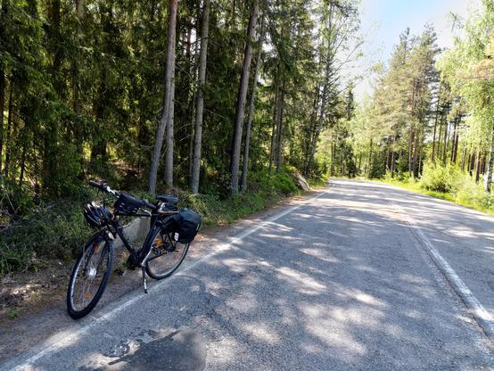 Bicycle on the side of a country road