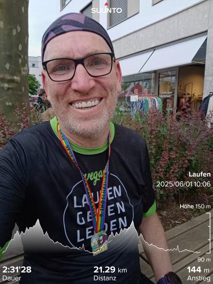 me with my medal and the time 2:31:28