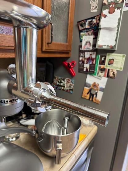 KitchenAid mixer with sausage stuffer attachment