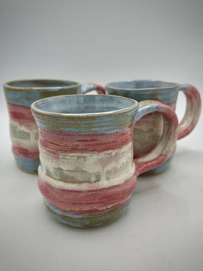 3 mugs in trans pride colours