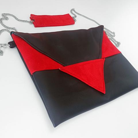 handmade shouder bag in black and red with a triangular geometric design