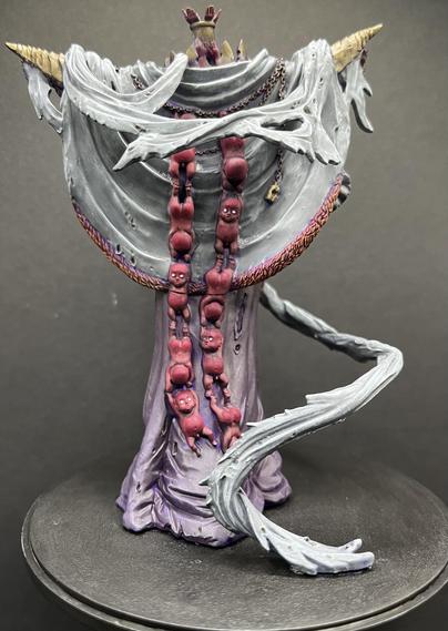 Rear facing painted miniature