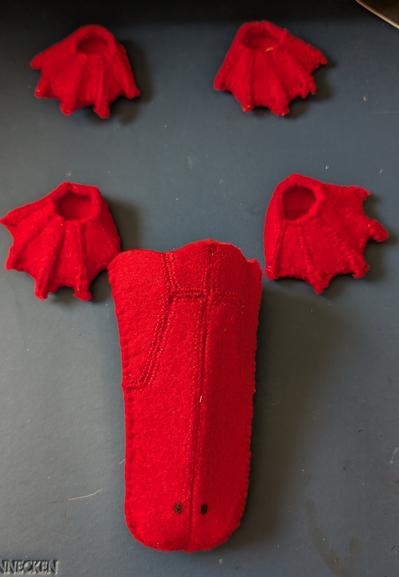 For swimming feet and a beak made of red felt.