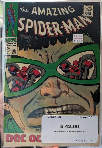 A comic cover. There's an extreme close up of Doctor Octopus' face. His glasses show his metal arms grappling Spider-Man in their reflection.