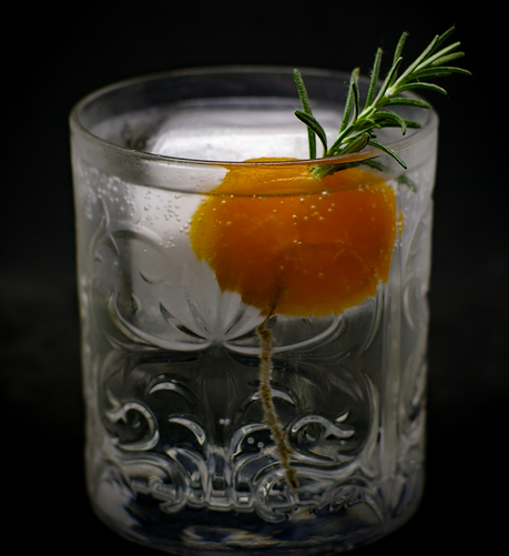 the cocktail itself in a chilled tumbler and garnish with a dehydrated apricot pierced with a rosemary sprung