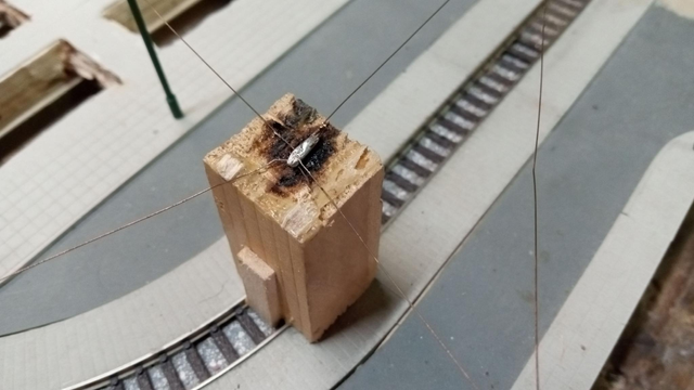 I made these wooden jigs for installing the overhead in the first place, and fortunately have managed not to loose them all