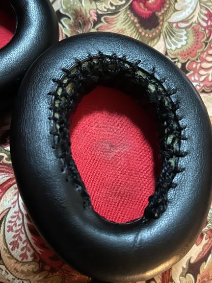 The whole thing stitched back together with a kind of netting between the two edges.