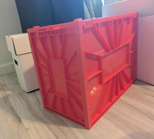 A red plastic short box from bcw.