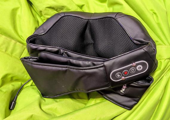 a cheap Naipo electrical massager, the plastic inside of which broke apart