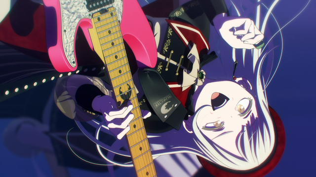 Mortis holding a guitar