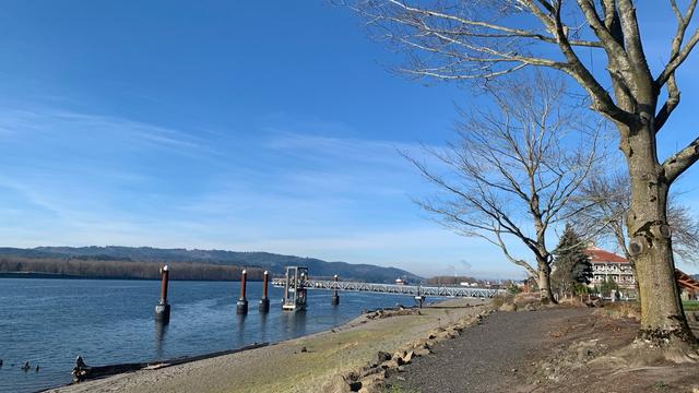Looking Northward on Columbia River from Kalama WA riverfront. A fishing pier is located in the photo.