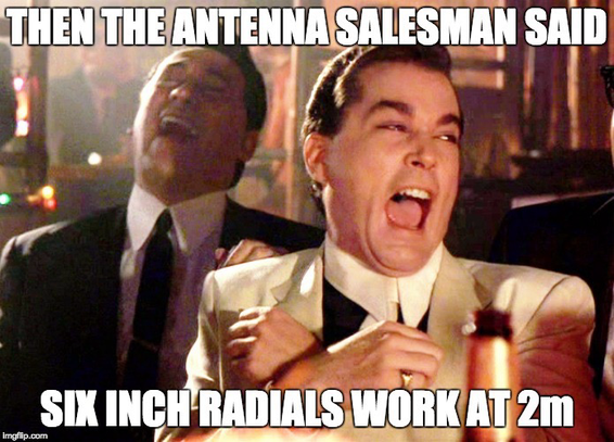 Two guys in a bar enjoying some adult beverages laughing. The title says then the antenna salesman said six inch radials work at 2 meters.