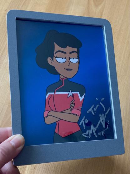 Photo von Ensing Mariner, wie es im Besitz von Captain ist. Darauf ein Autogramm “for Tanja (leicht verwischt) Tawny Newsome ‘Mar’”