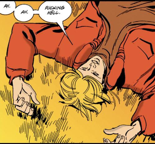 A young man in a brown T-shirt and red jacket lies back in the yellowed grass, eyes closed. He says. “AH. AH.  FUCKING HELL.“