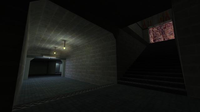 In the picture you can see a hallway. From the right to left you can see a staircase that leads outside, a hallway that leads to the right (from the view when you go down the stairs) where two yellow lamps hang from the ceiling, a passageway where a white illuminated lamp is attached at the top, another hallway that goes left and right. If you go down the hallway to the right, you can go down a staircase to the left, where you get to a larger hall. This is on the map de_nuke in the game Counter-Strike 1.6.