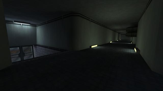 In this picture you can see the other hallway, from the previous picture. From left to right you can see a staircase leading down to a door. Above this is a white-lit lamp mounted on the ceiling. Furthermore, you can see that the hallway extends further back. On the floor you can see four yellow-lit lamps on the left and right attached to the wall. On the right wall you can also see two metal pipes. This is on the map de_nuke in the game Counter-Strike 1.6.