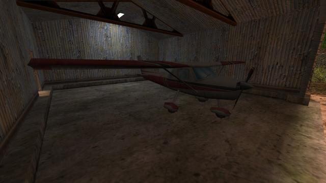 In this picture you can see the Cessna up close. Furthermore, you can see that the hangar has a rear left passage. This is on the map de_airstrip in the game Counter-Strike 1.6.