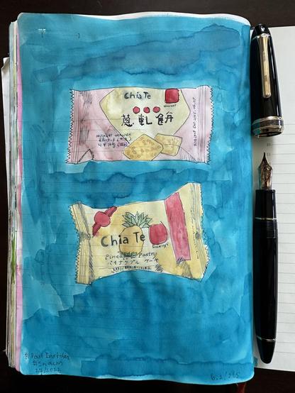 #Sketch in sketchbook of twonTaiwanese snacks. One had a pinkish color with two cheese filled crackers. The other is a little pineapple cake