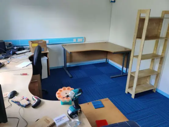 Inside of RC2014 Towers, now with 3 empty office desks in it. Well, mostly empty, there are some tools and other detritus spread around a bit.