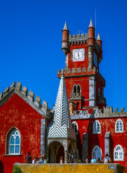 Strikingly red fairytale like clock tower of Pena Palace, Sintra, Portugal 
Captured by Komeil Karimi