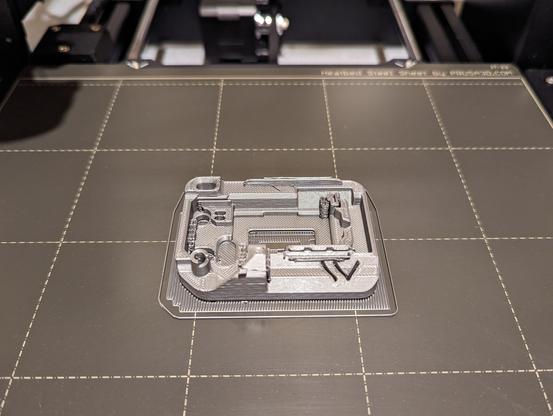 front half of completed Heltec V3 case front half sitting on 3D printer