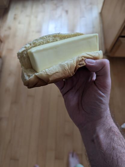 A whole stick of butter fits perfectly in a hotdog bun.
