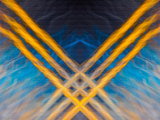 Photo art based on a picture of a rolling gate at blast furnace 5 in the Duisburg-Nord Landscape Park, Duisburg, North Rhine-Westphalia, GermanyThe original shot used the creative technique of intentional camera movement. This image was mirrored and recomposed to achieve the symmetry effect.