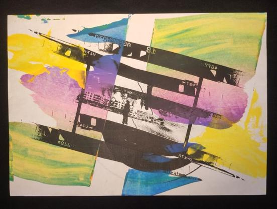 A screen printed collage with two times a photo of an analog photo of a person with a stick and houses in the background plus the colors of the rainbow which are fading into each other.