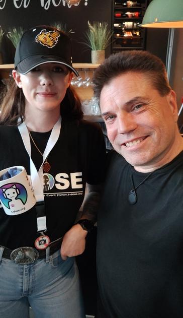Selfie taken with me by Marcel van der Velde, with a "no photographing" sign worn by me.