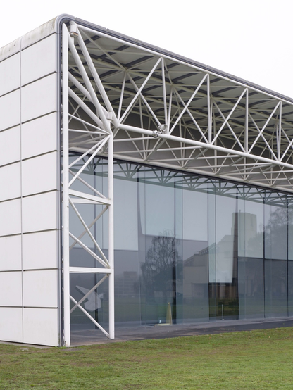A colour photograph financier recent of the steel and glass Sainsbury Centre in Norwich